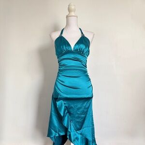 Aqua blue satin halter neck ruffle dress.